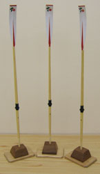 Vertically mounted pencil oars for a crew who won in the Empire and Commonwealth Games.